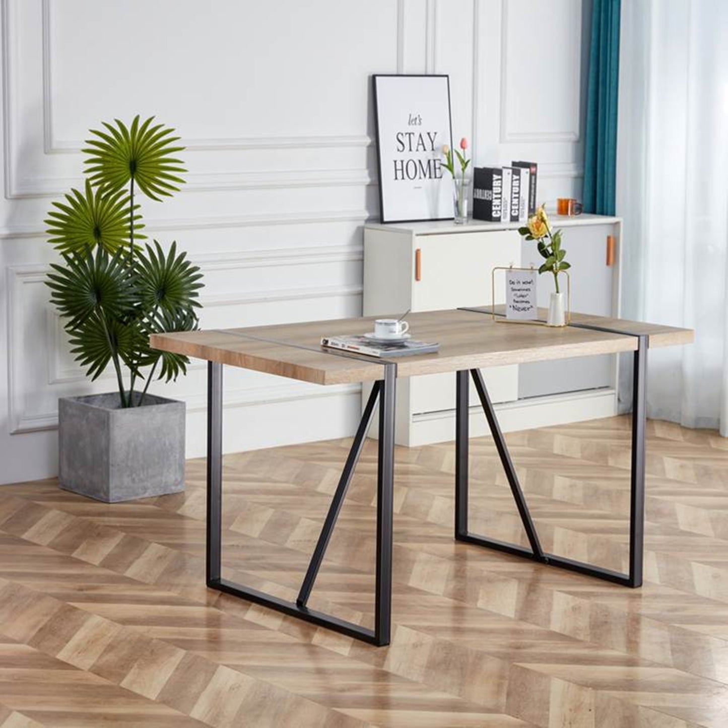 Light oak dining table with black metal legs
