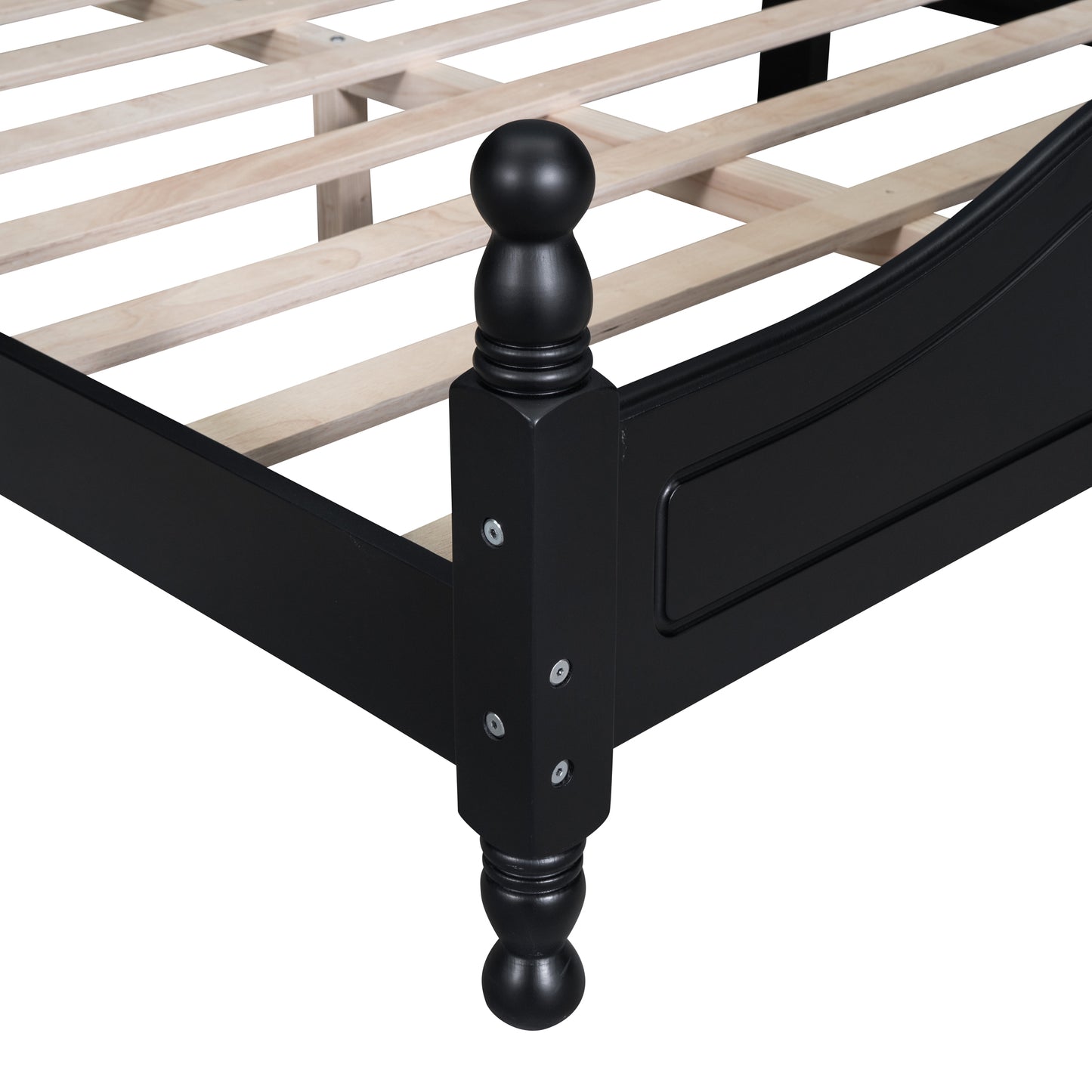Black wooden bed frame detail with slatted base and turned leg post