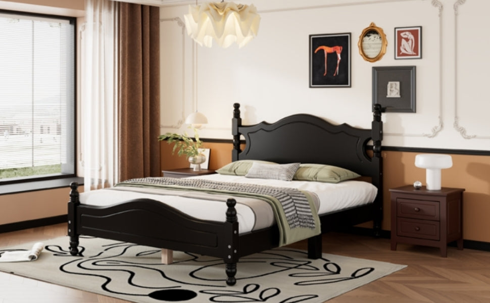 Elegant black wooden bed frame with carved headboard and footboard