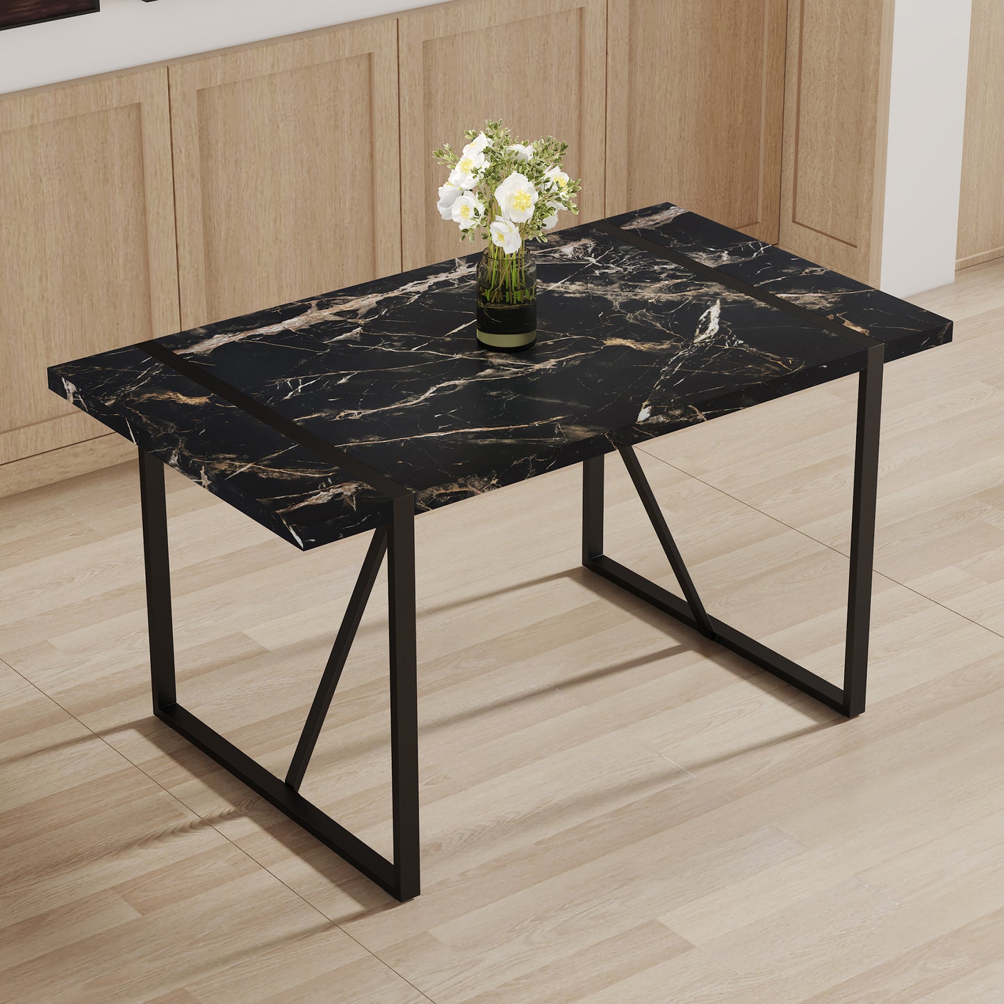 Black marble dining table with gold veining and black metal legs