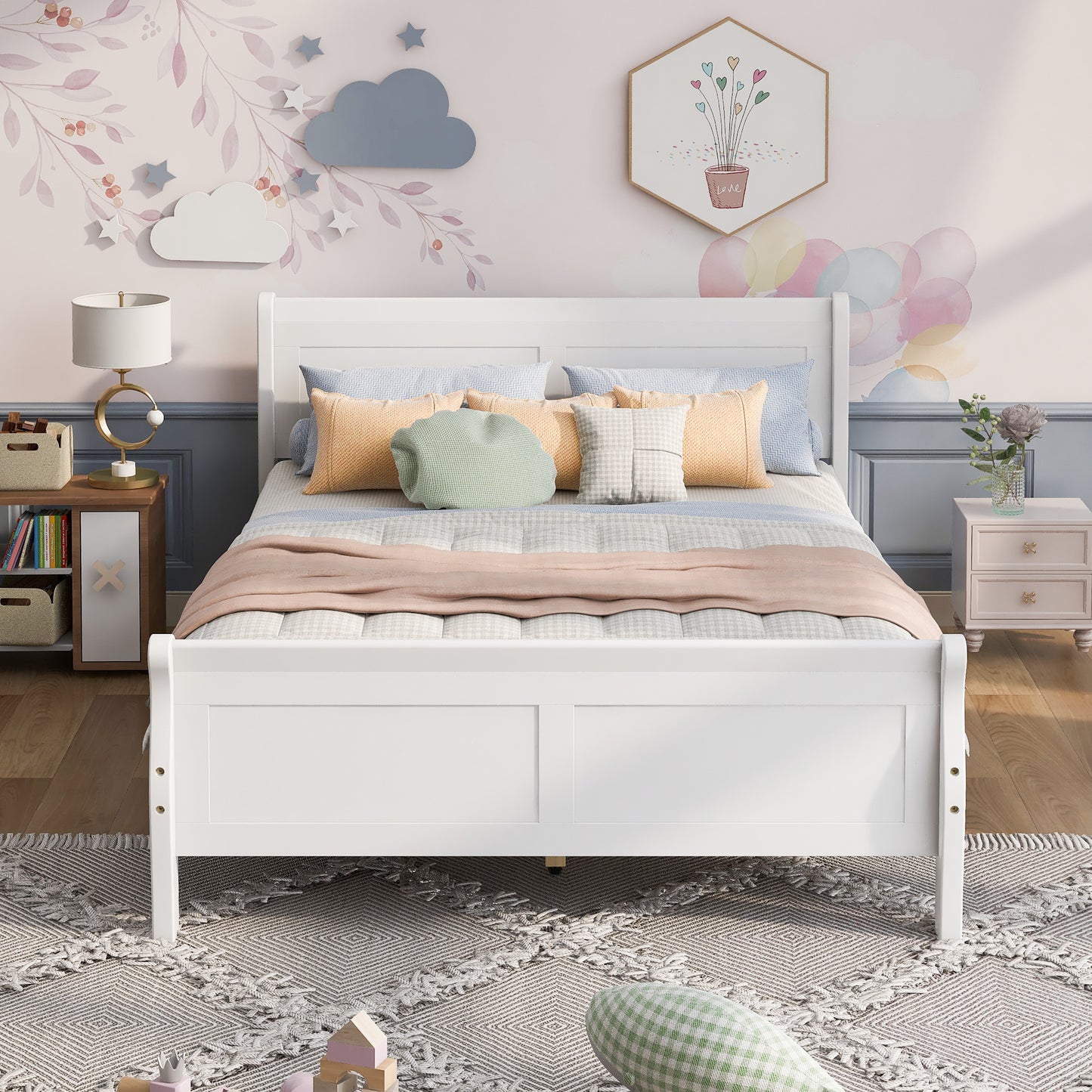 White sleigh bed frame with upholstered headboard perfect for a childs bedroom