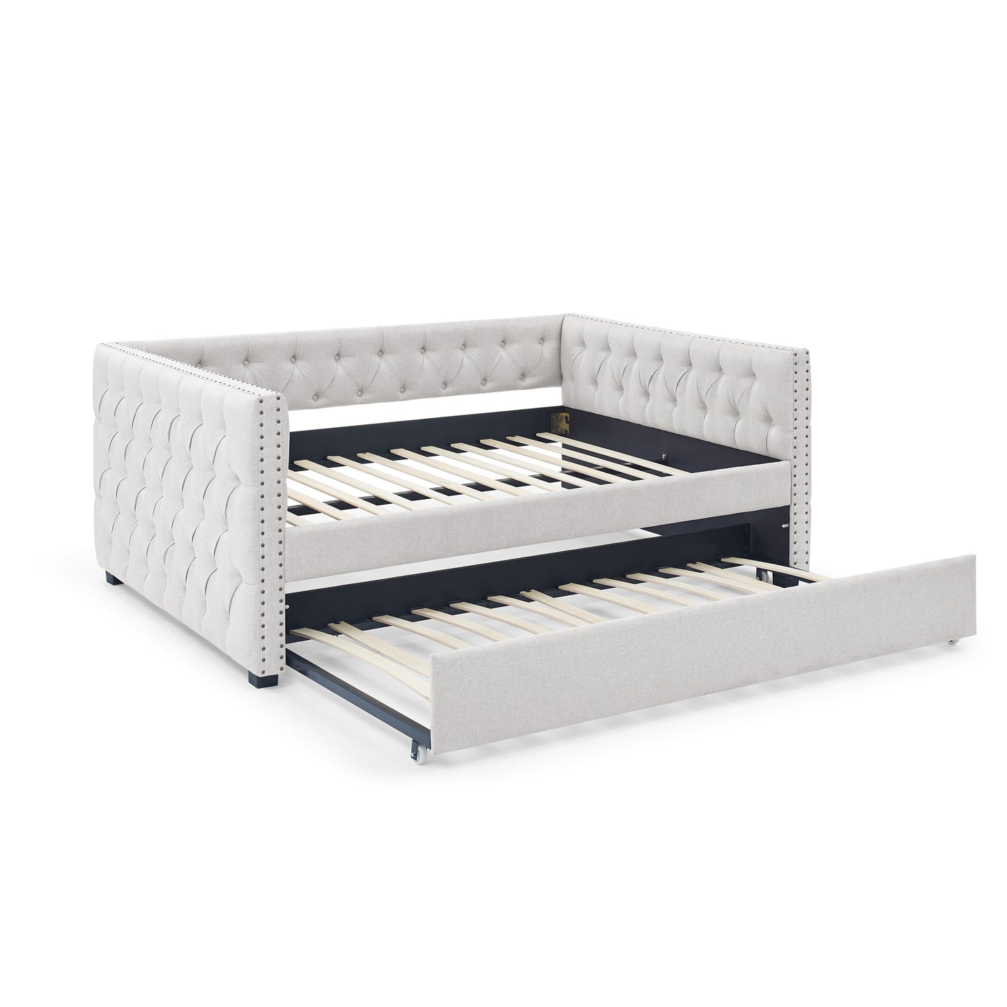 Light grey tufted daybed with pullout trundle perfect for guest rooms