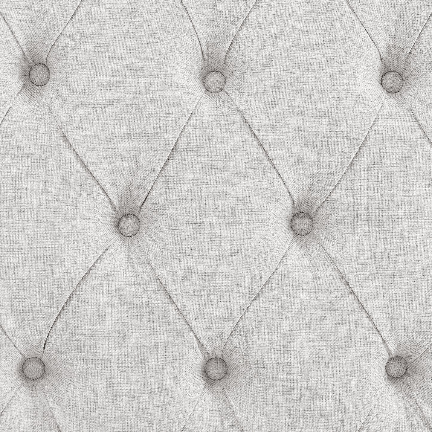 Closeup of a light gray textured fabric with diamond tufting and buttons ideal for upholstery