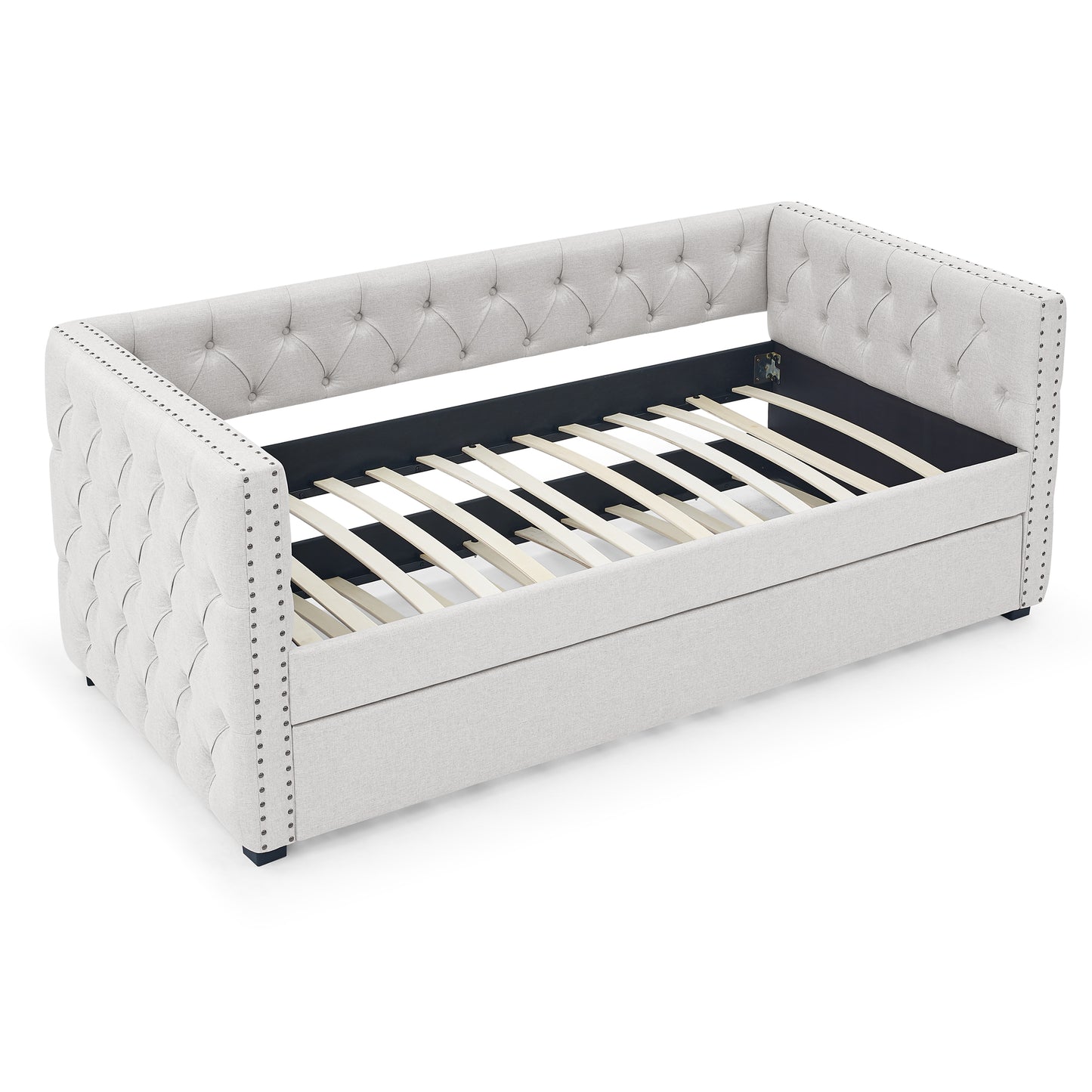 Tufted light grey upholstered daybed with nailhead trim and wooden slats perfect for guest rooms