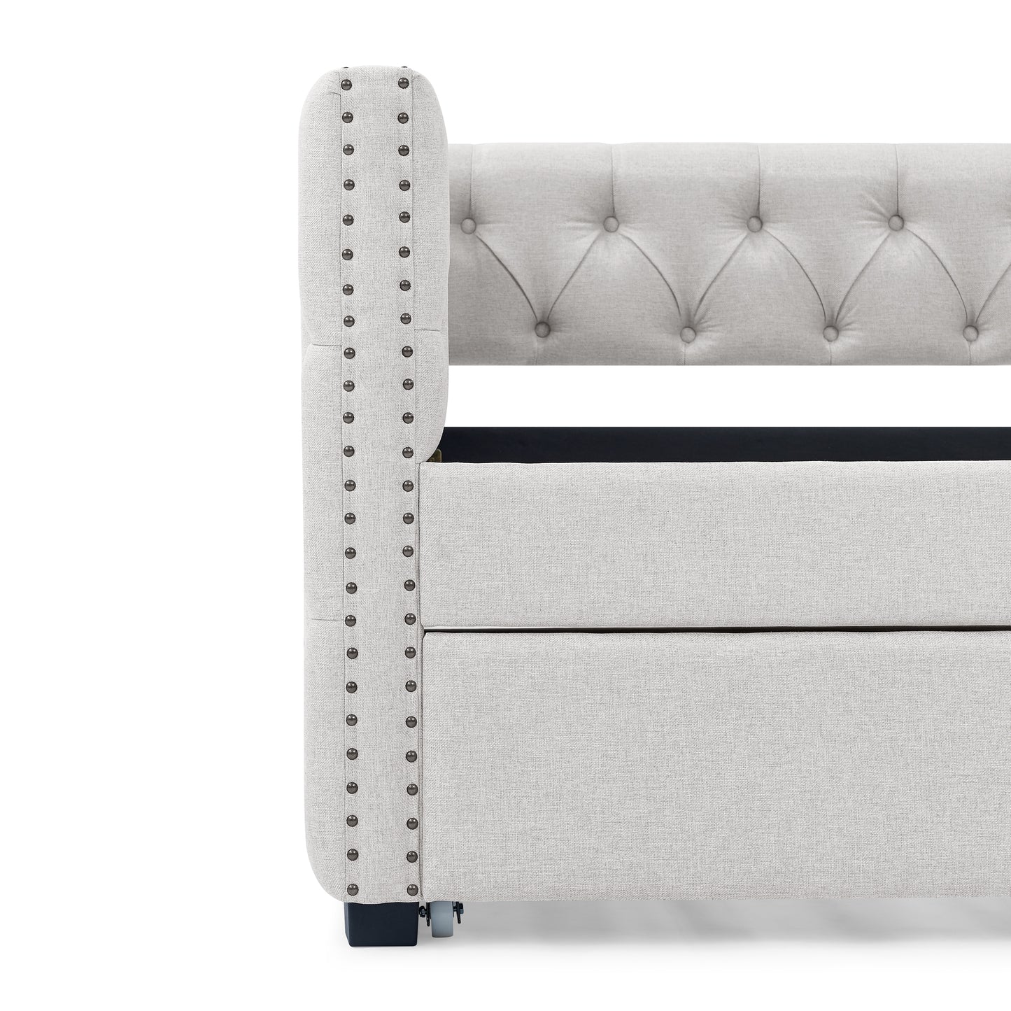 Light grey fabric bed frame with tufted headboard and nailhead trim