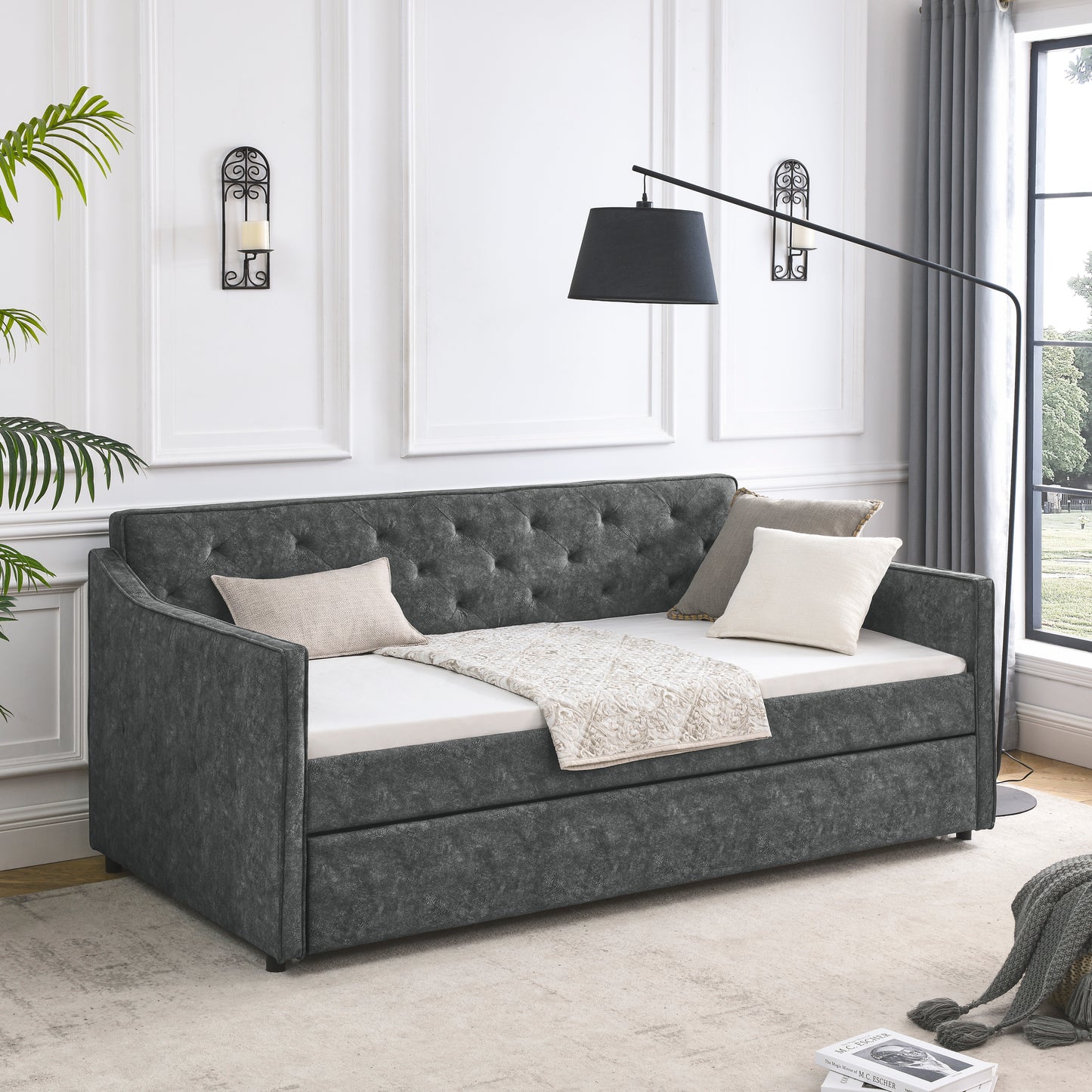 Dark grey tufted daybed with mattress and decorative pillows modern living room furniture