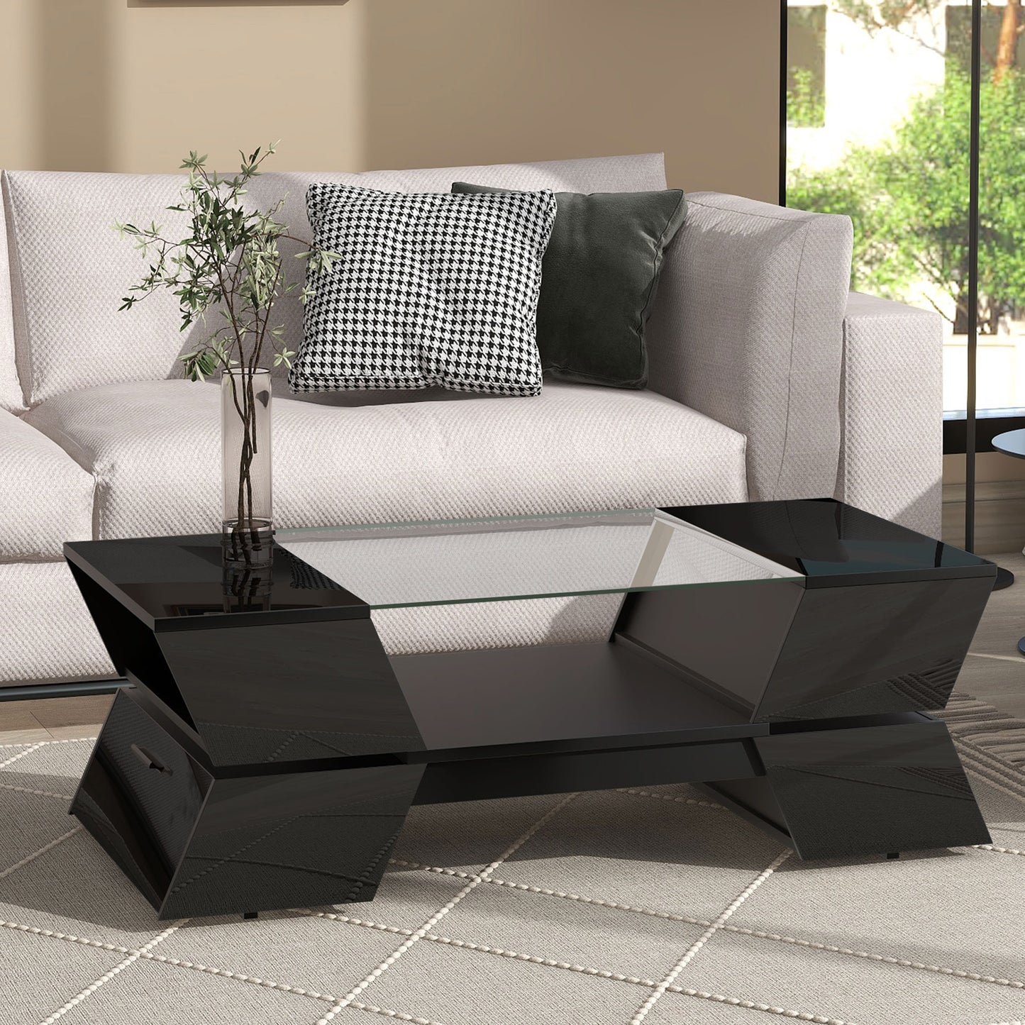 Glossy black coffee table with glass top and modern geometric design