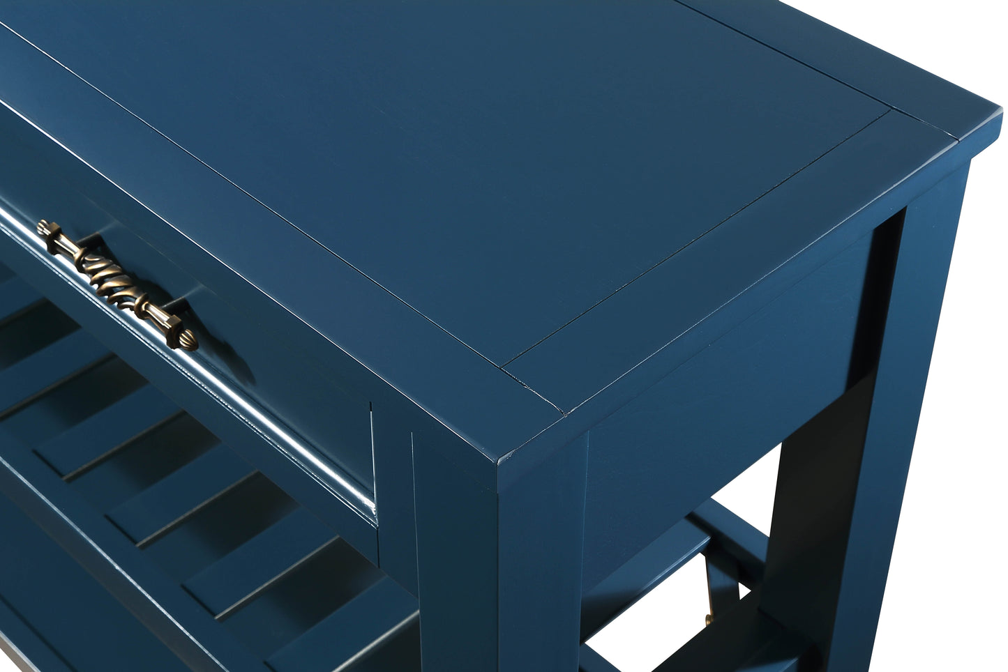 Navy blue kitchen island with a single drawer and brass handle