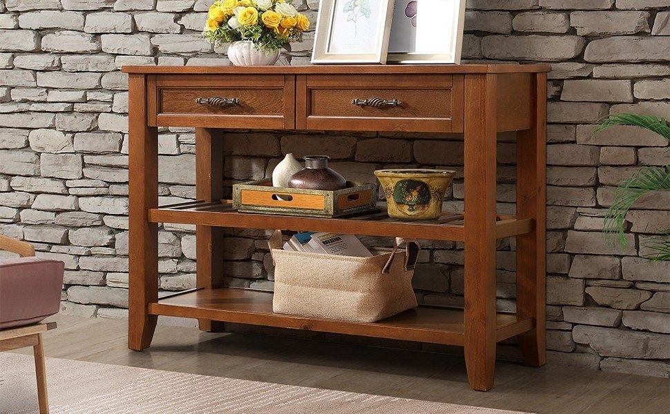 Wooden console table with two drawers open shelves and decorative items