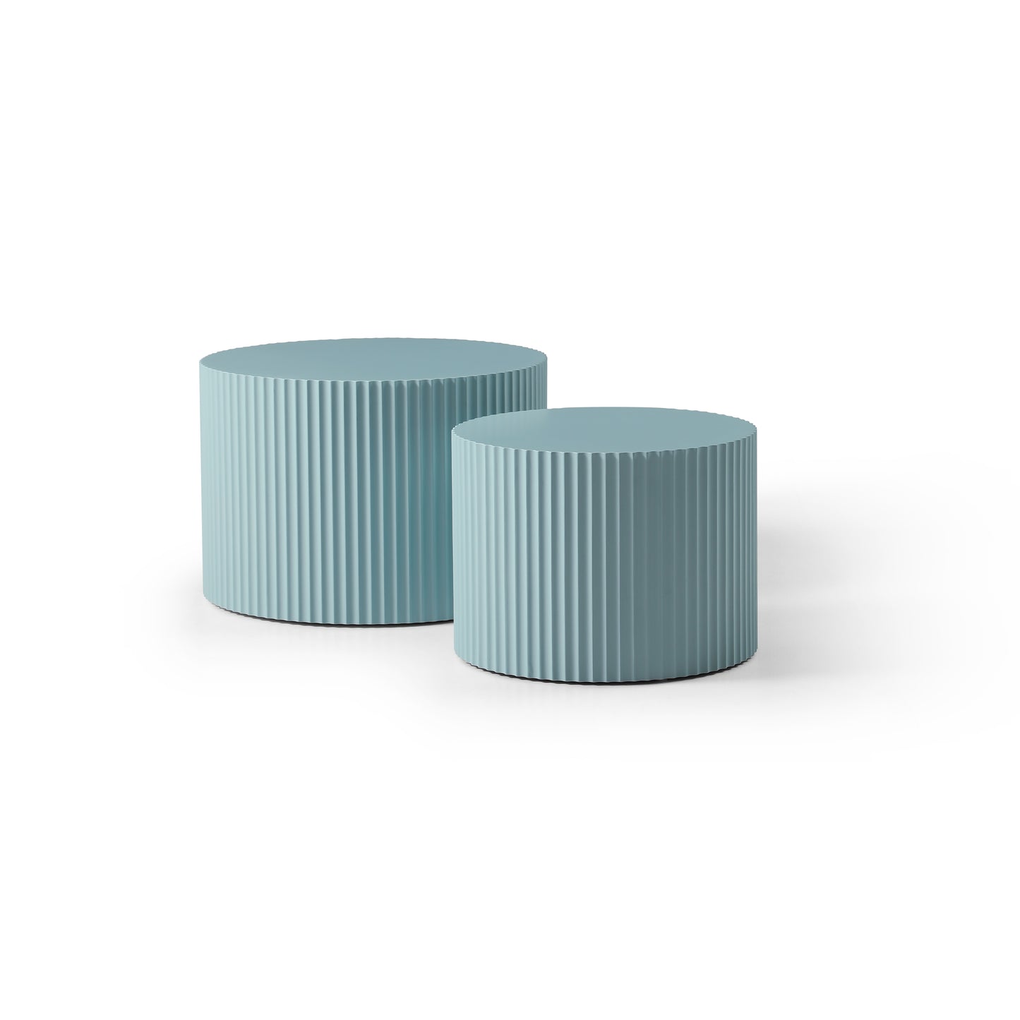 Two fluted cylindrical side tables in a serene blue hue perfect for modern living rooms