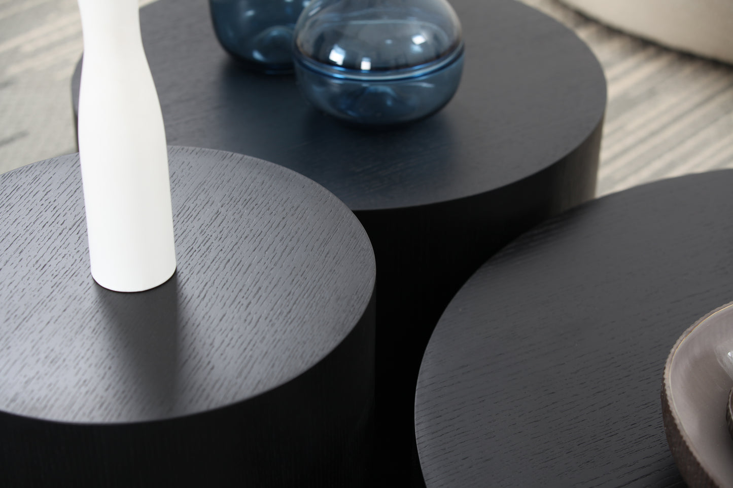 Dark oak nesting coffee tables with a matte finish set of three
