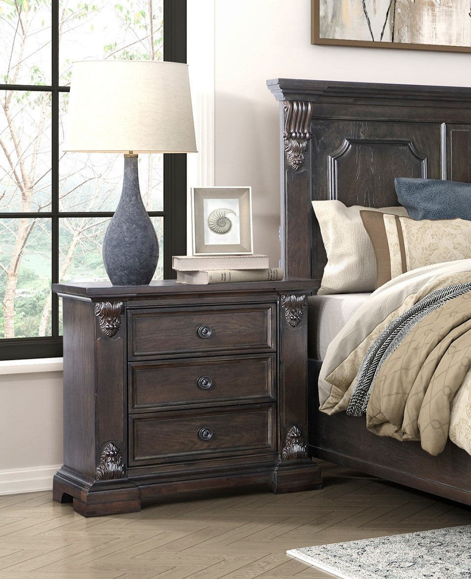 Dark wood ornate nightstand with three drawers and antique brass pulls