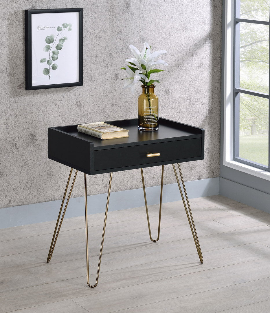 Black accent table with brass hairpin legs and one drawer