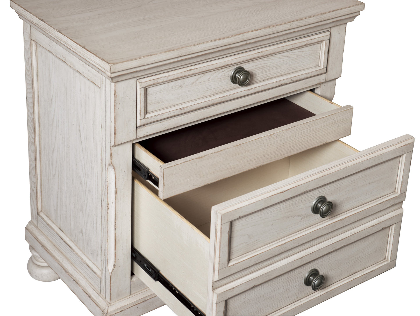 Distressed white wood nightstand with three drawers and antique brass knobs