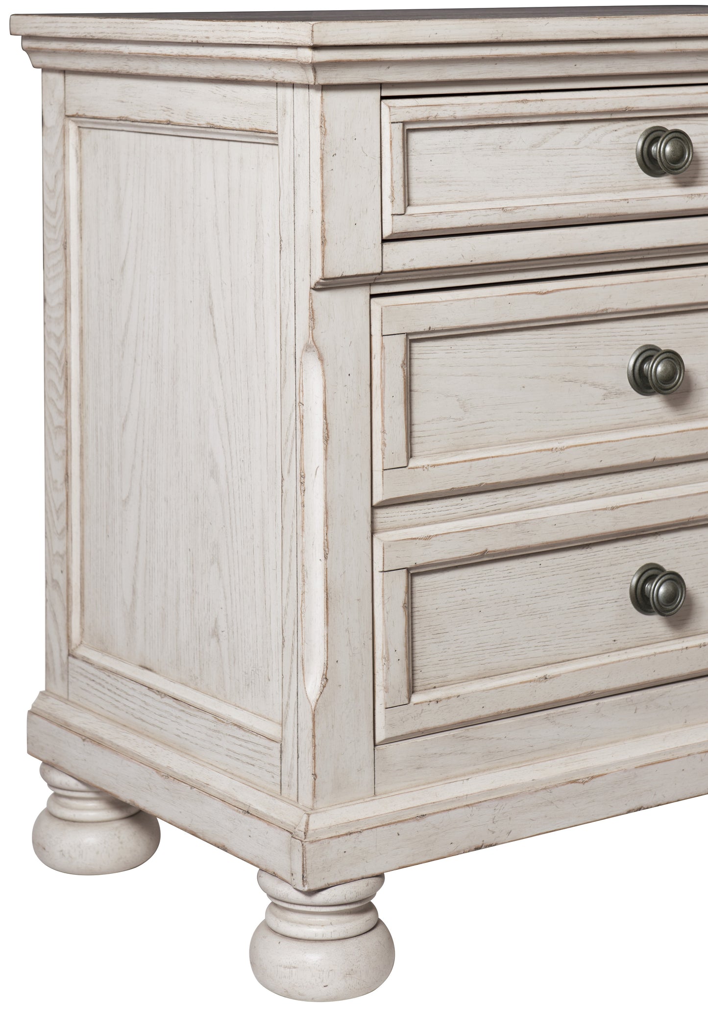 Distressed white wood dresser with ornate metal knobs and turned legs