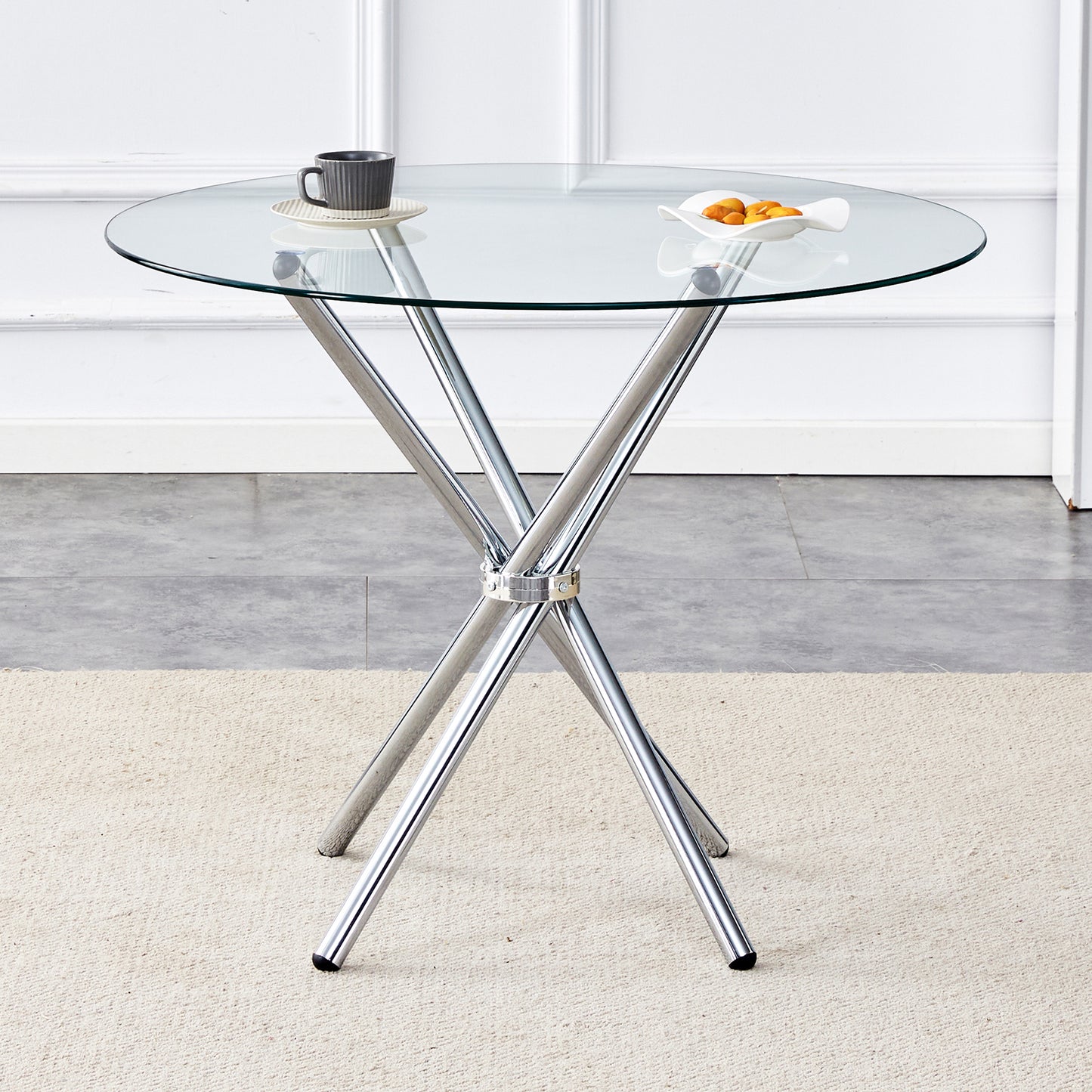 Round glass dining table with chrome base