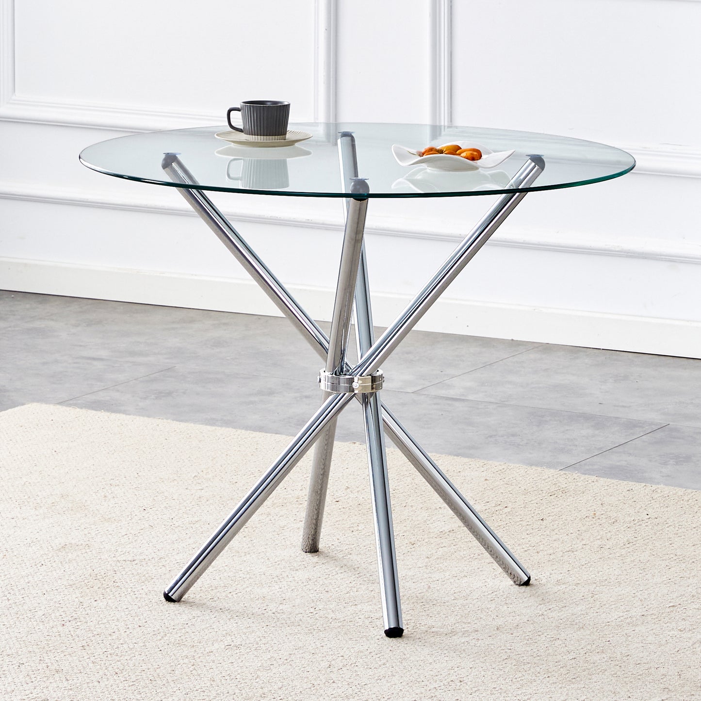 Round glass top dining table with chrome base