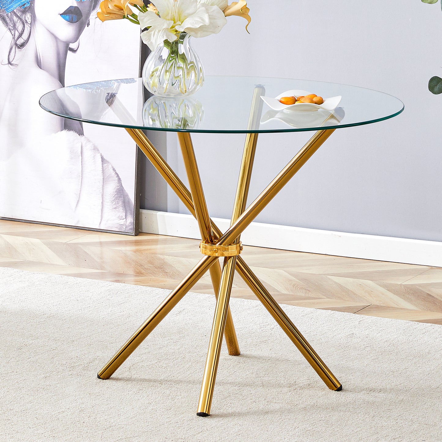 Gold accent round glass coffee table with modern metallic base