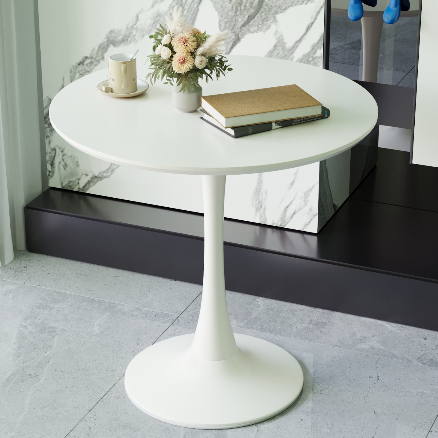 White tulipstyle round dining table with pedestal base