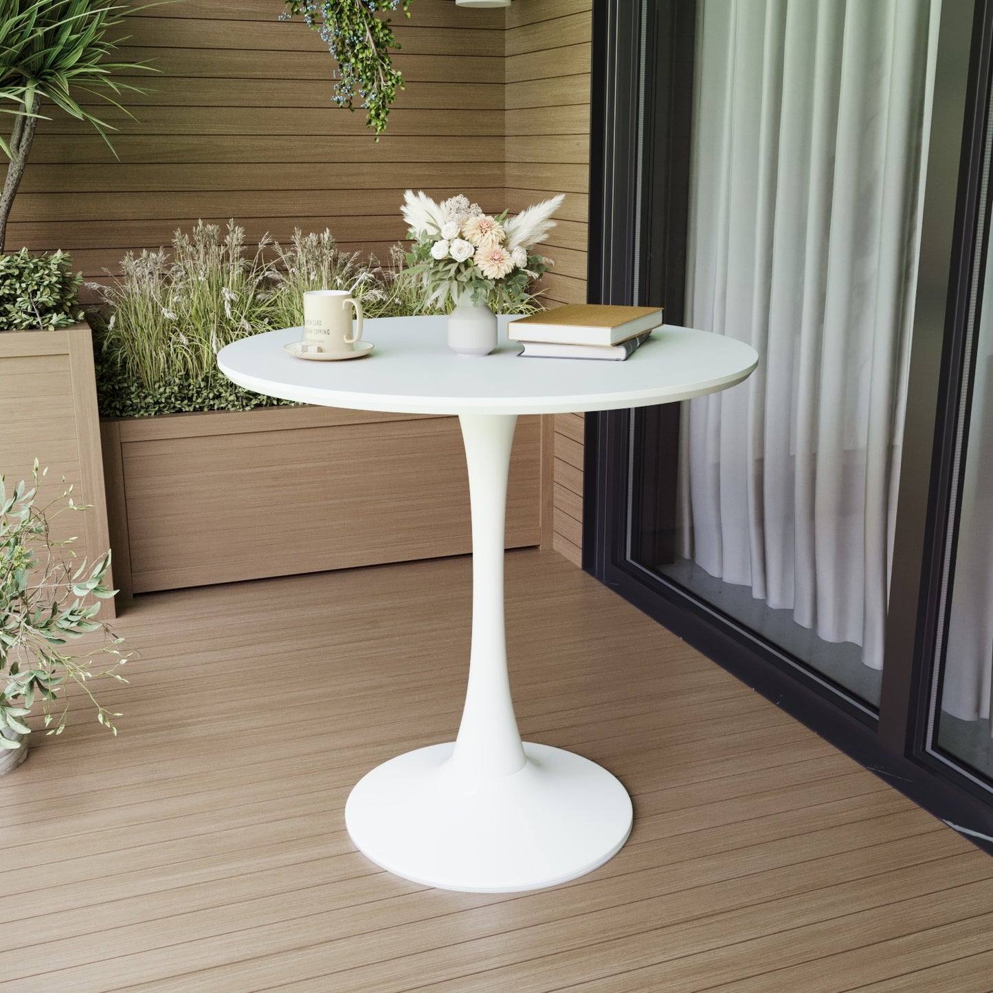 White tulip style side table on a wooden deck