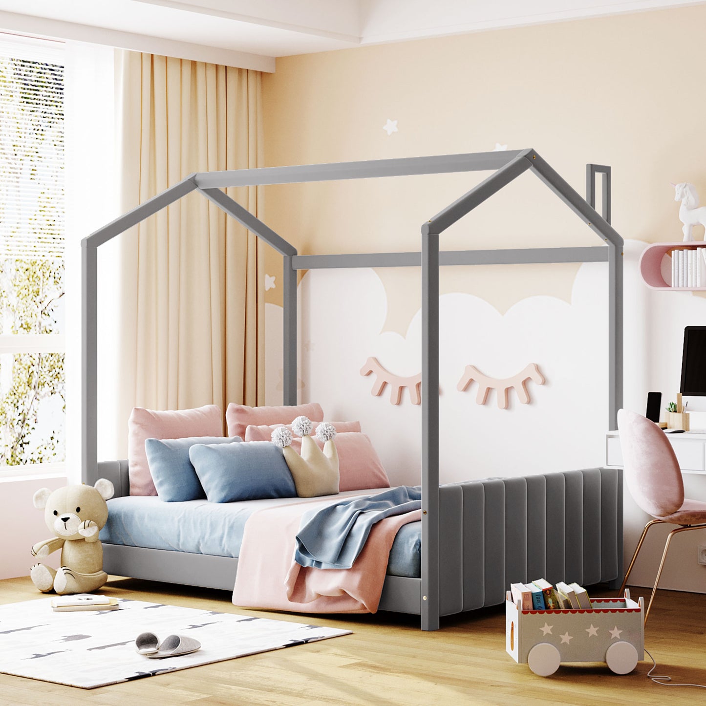 Gray wooden house bed frame with soft bedding and playful cloud wall art