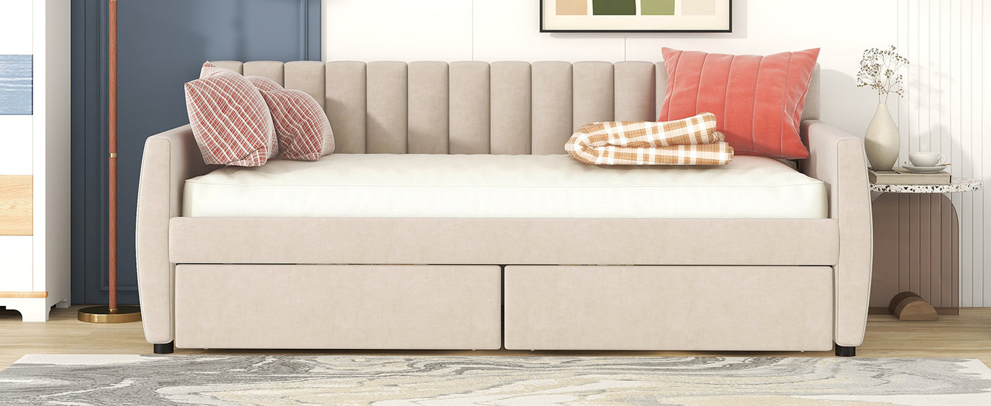Beige velvet daybed with fluted back two drawers and decorative pillows