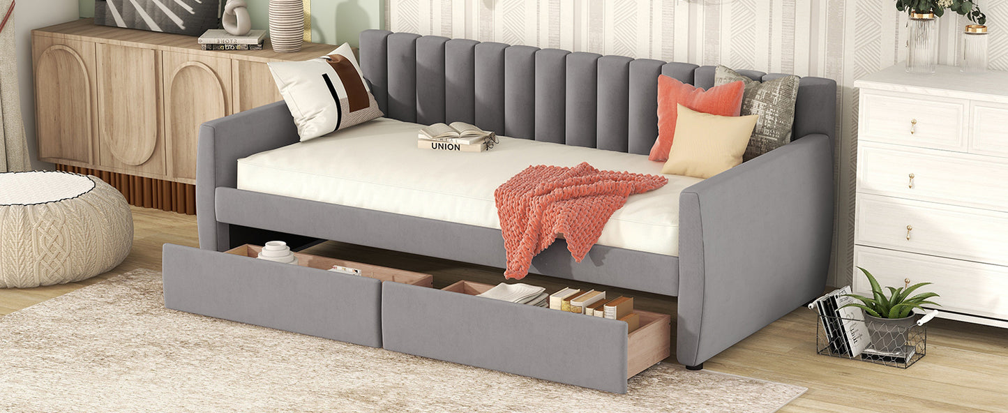 Gray velvet daybed with tufted back and two storage drawers underneath
