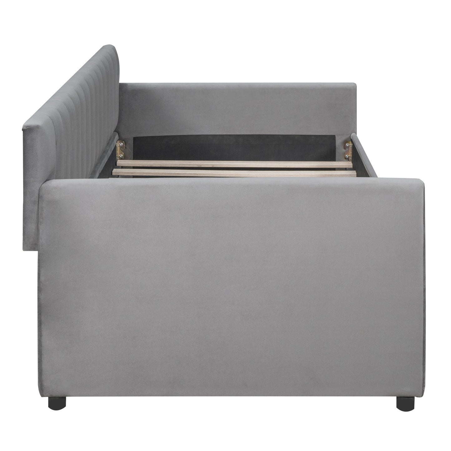 Plush grey velvet daybed with channeltufted backrest and wooden slats for mattress support