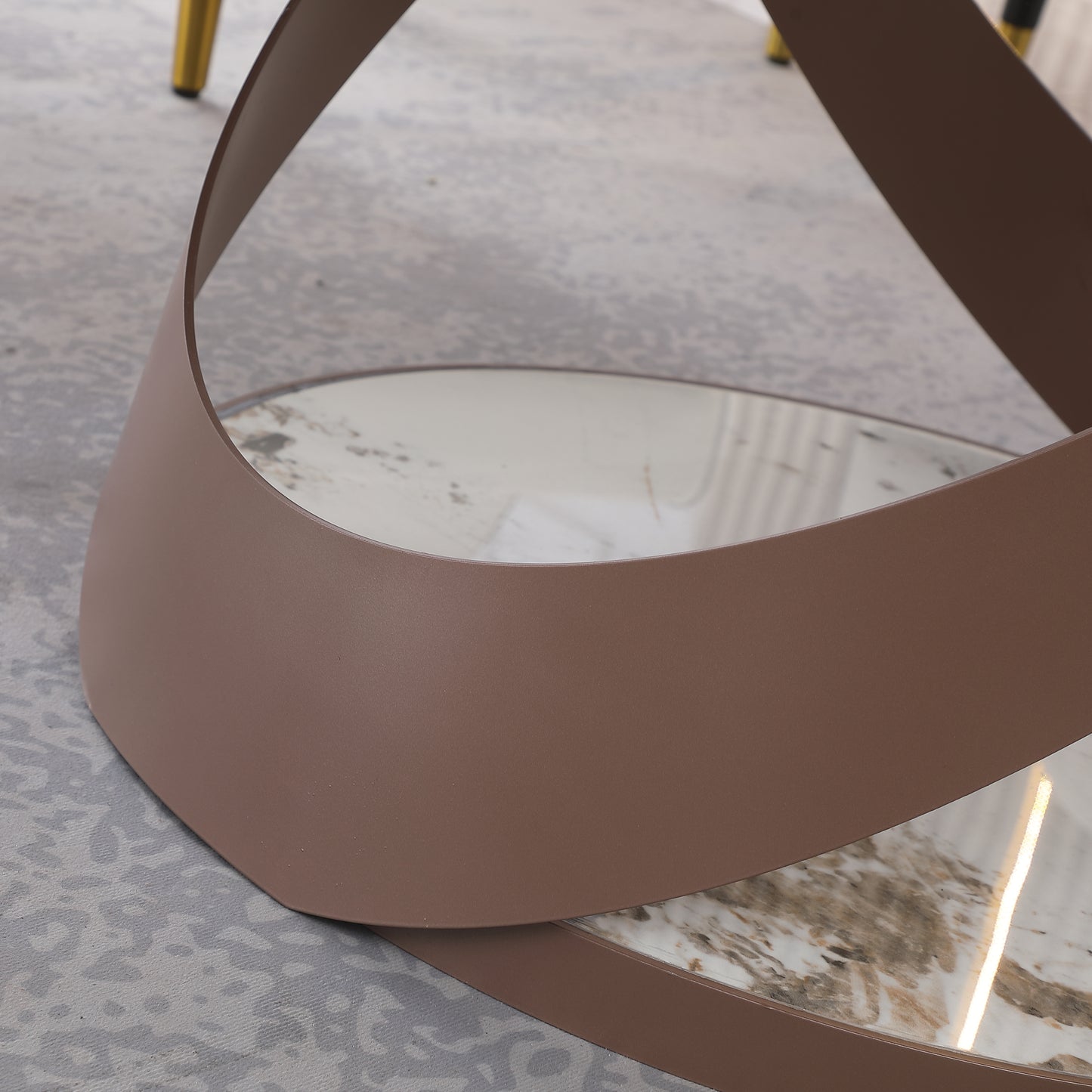 Modern bronze abstract coffee table with marble inlay and gold legs