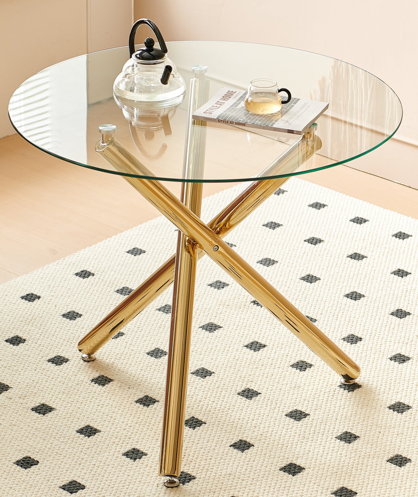 Round glass coffee table with gold metal Xbase