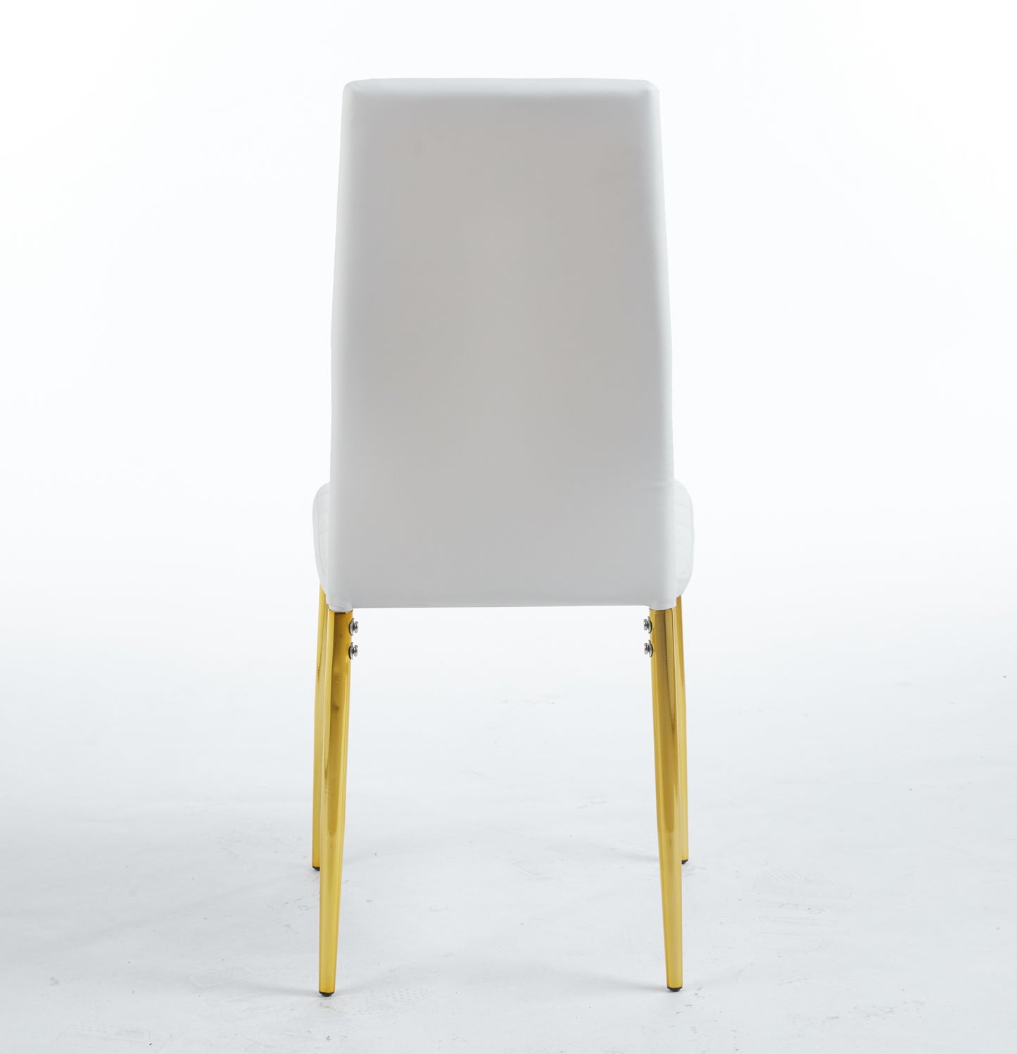 White upholstered accent chair with shiny gold tapered legs