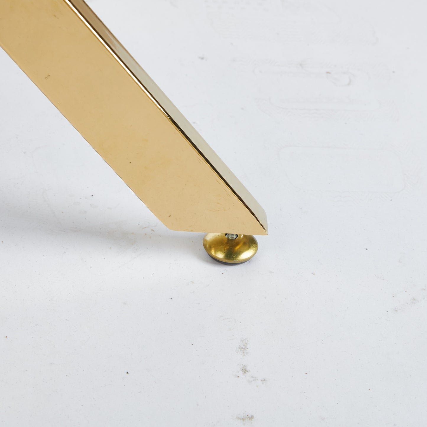 Polished brass furniture leg with adjustable foot