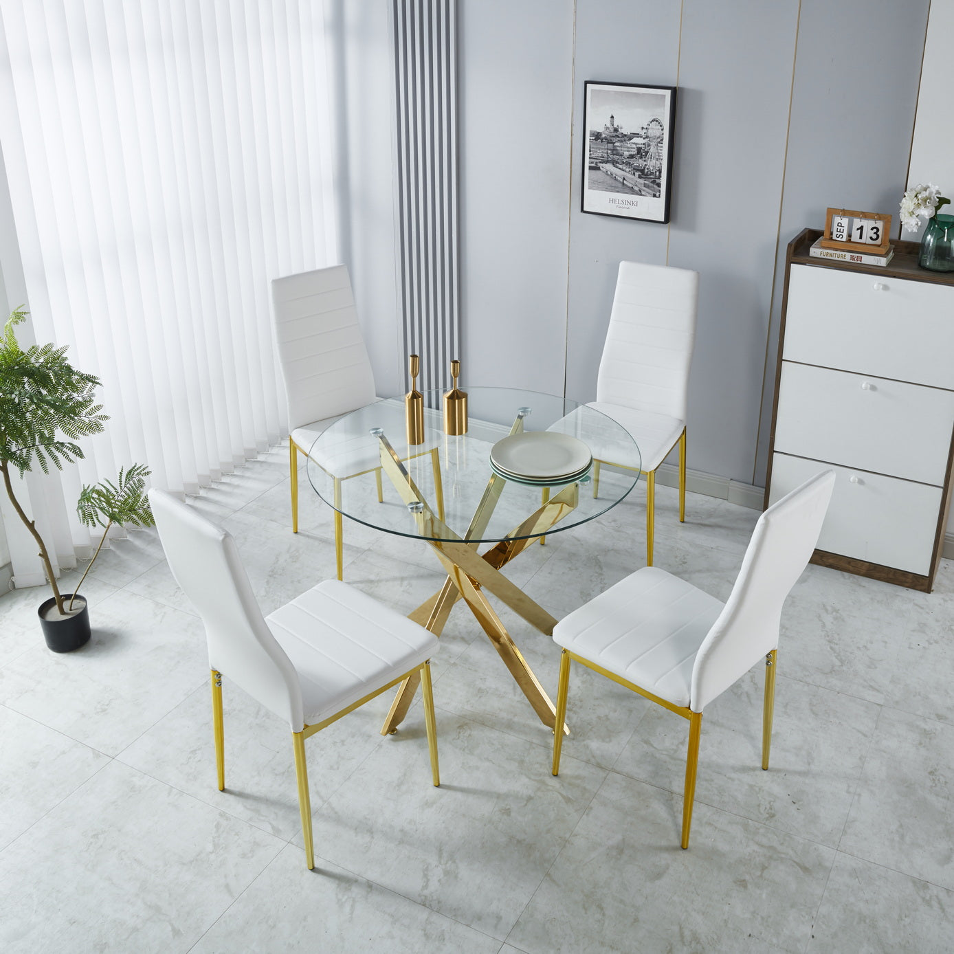Round glass dining table with gold legs