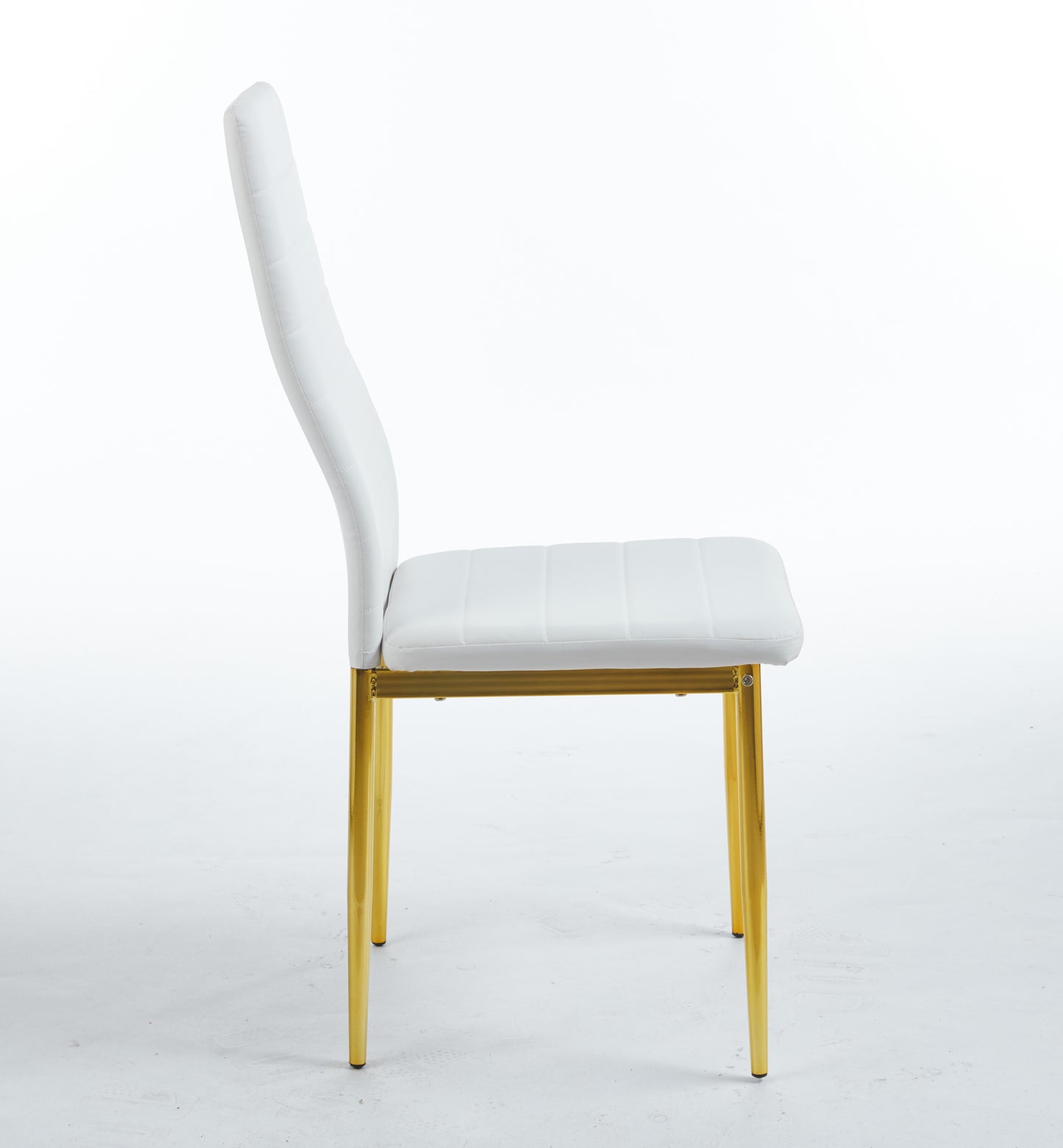 White faux leather dining chair with quilted seat and gold metal legs