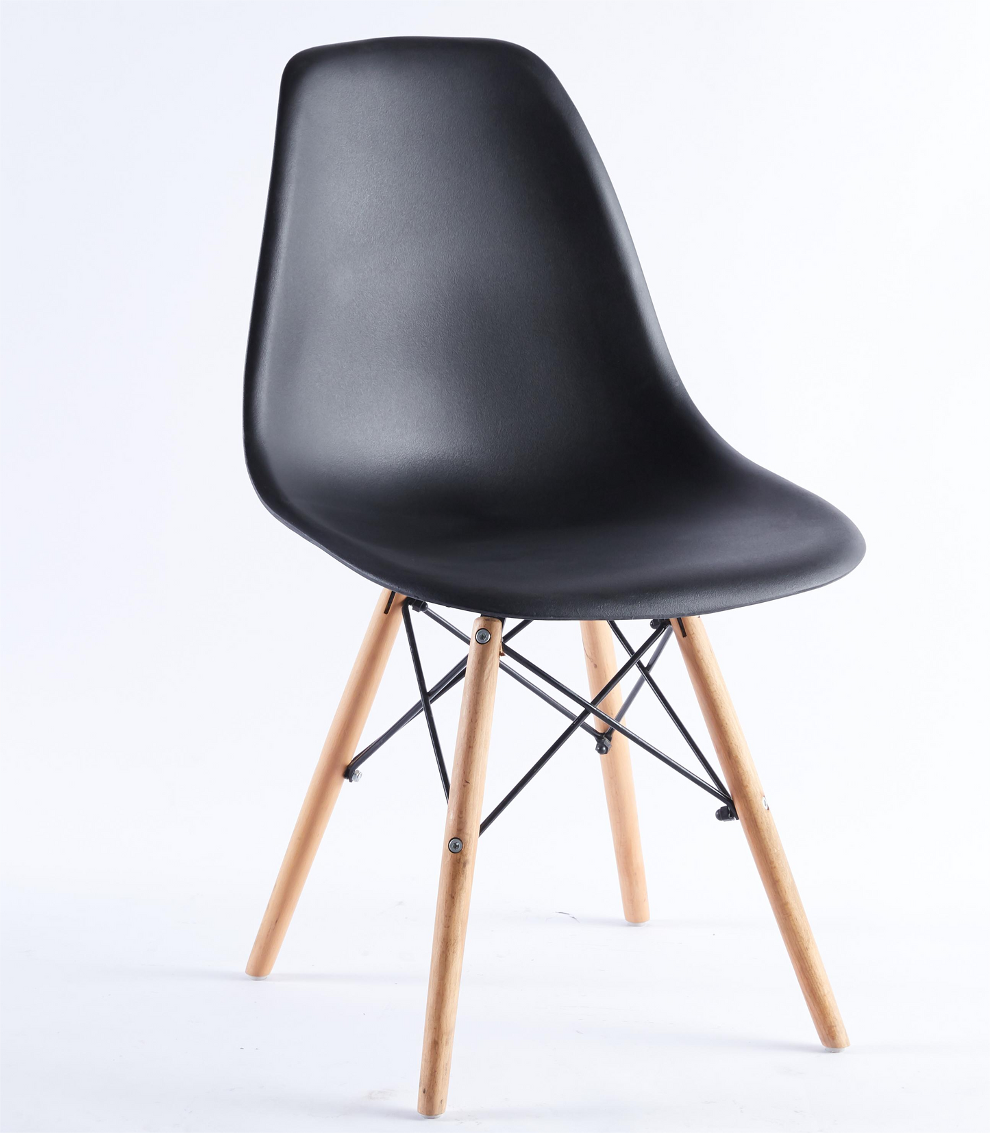 Black molded dining chair with natural wood dowel legs
