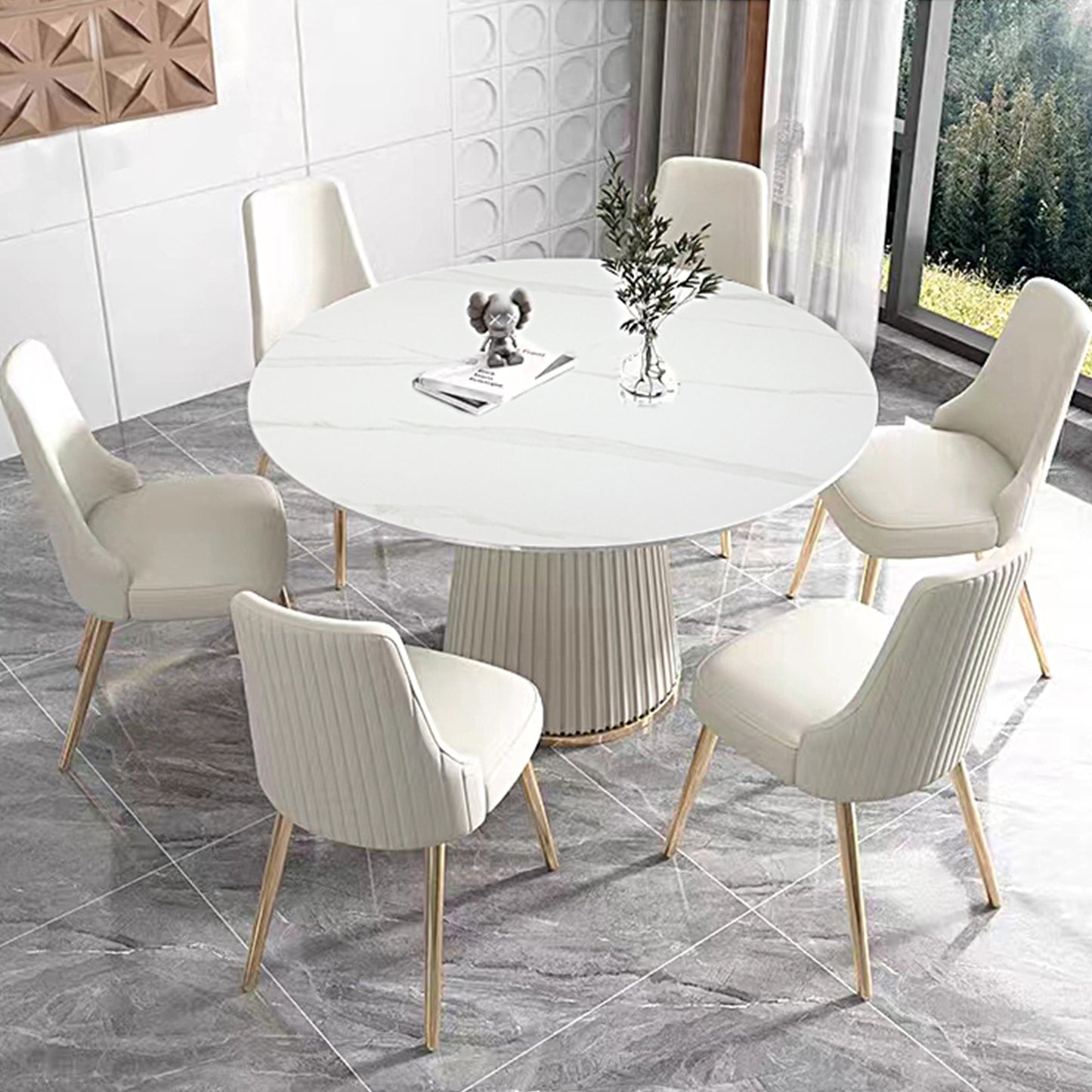 Round white marble top dining table with fluted pedestal base
