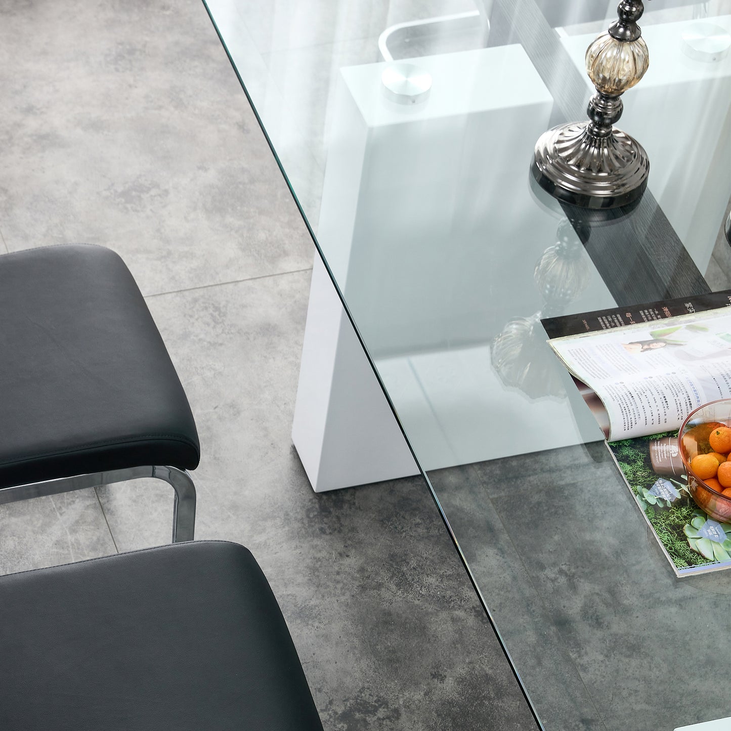 Black leather dining chair with chrome legs