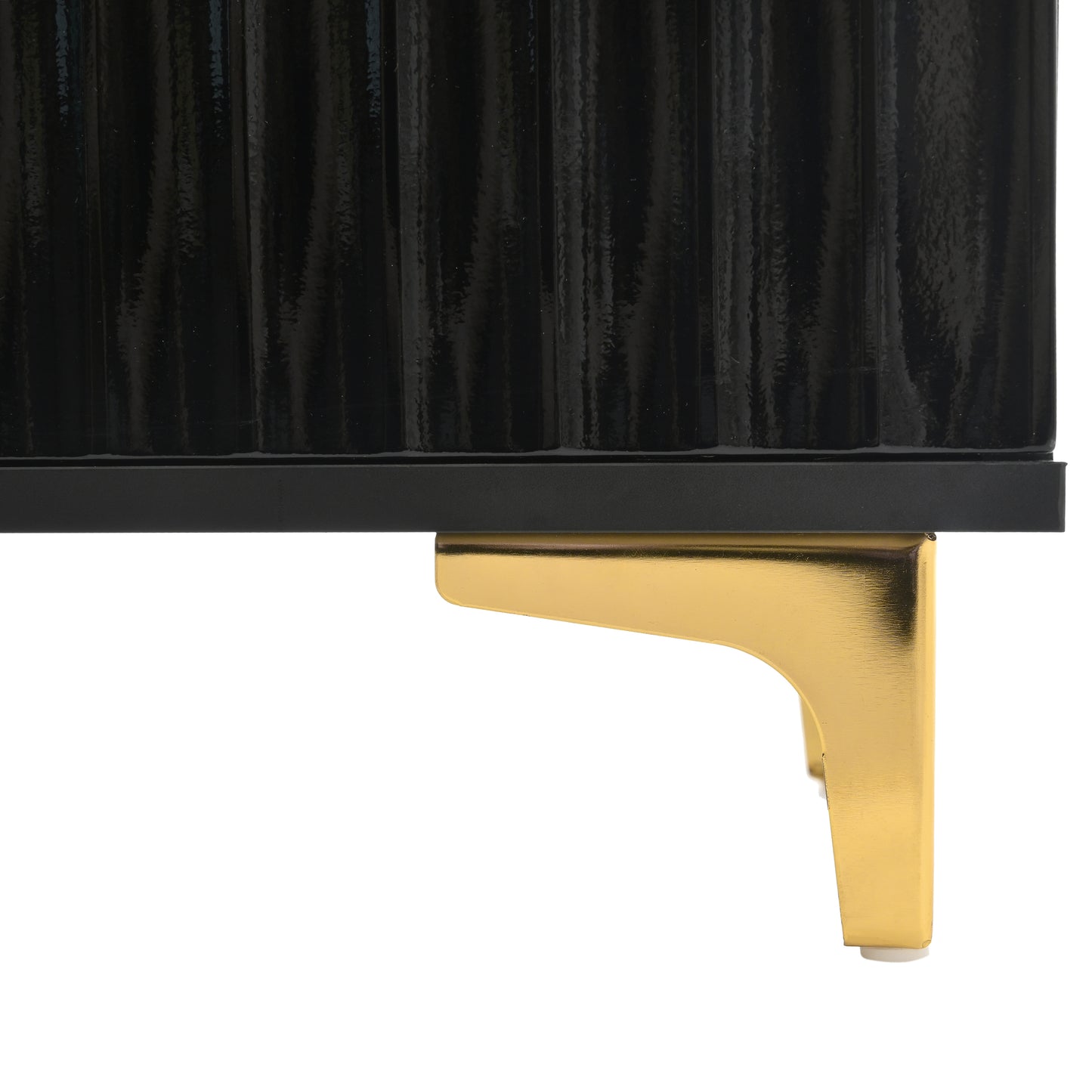 Glossy black cabinet detail with ornate gold legs