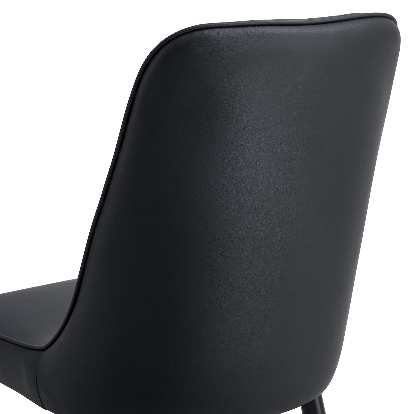 Black faux leather dining chair back and seat detail