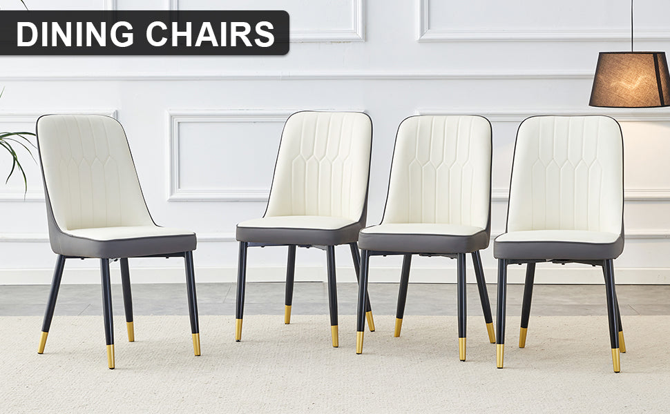 Set of cream upholstered dining chairs with goldtipped black legs
