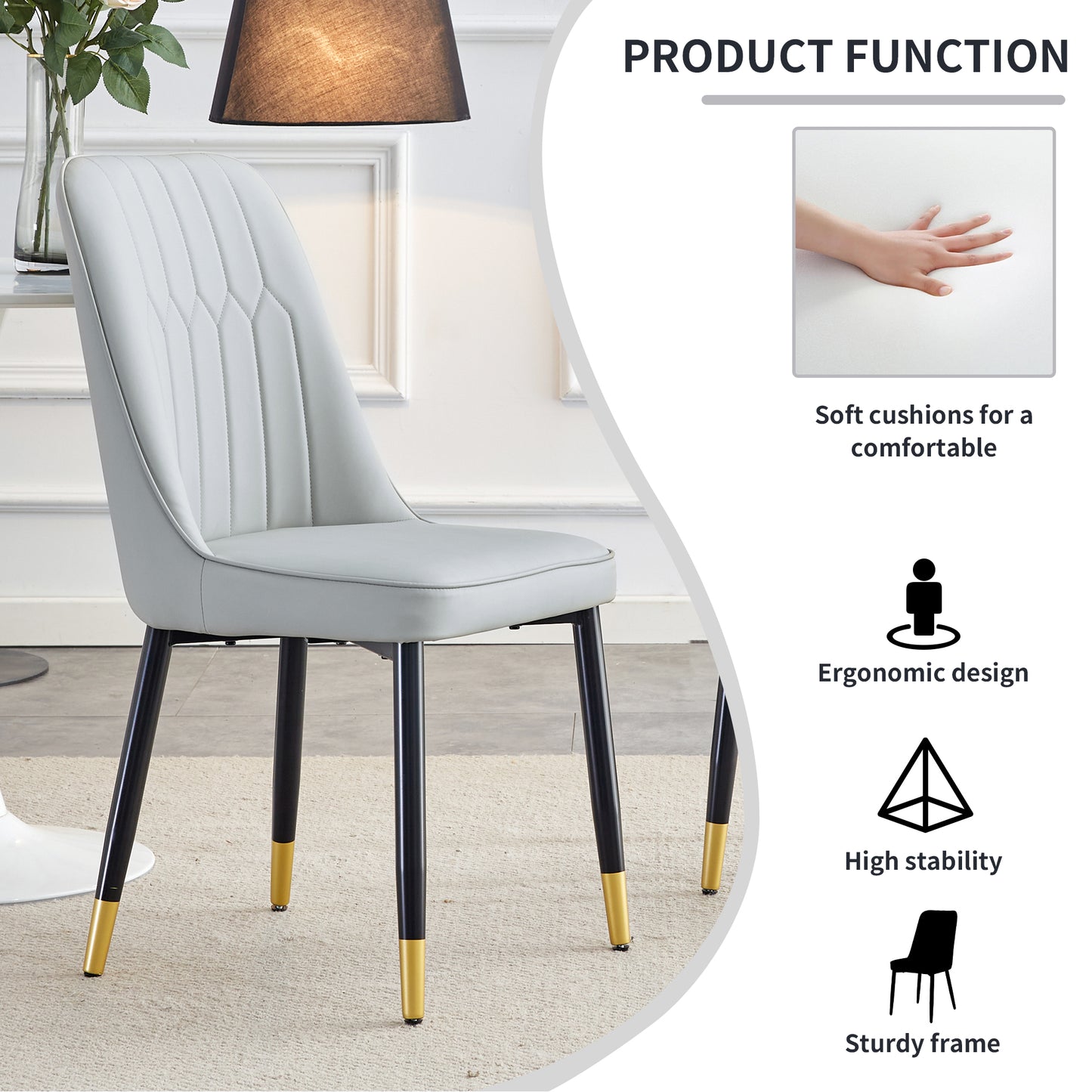 Light gray upholstered dining chair with stitched back and black metal legs with gold tips