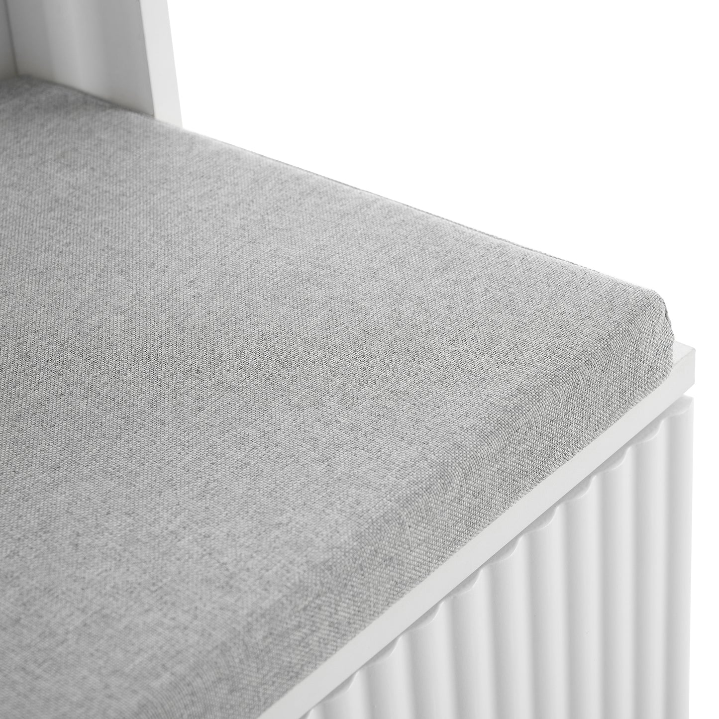 Gray upholstered bench cushion with textured fabric detail