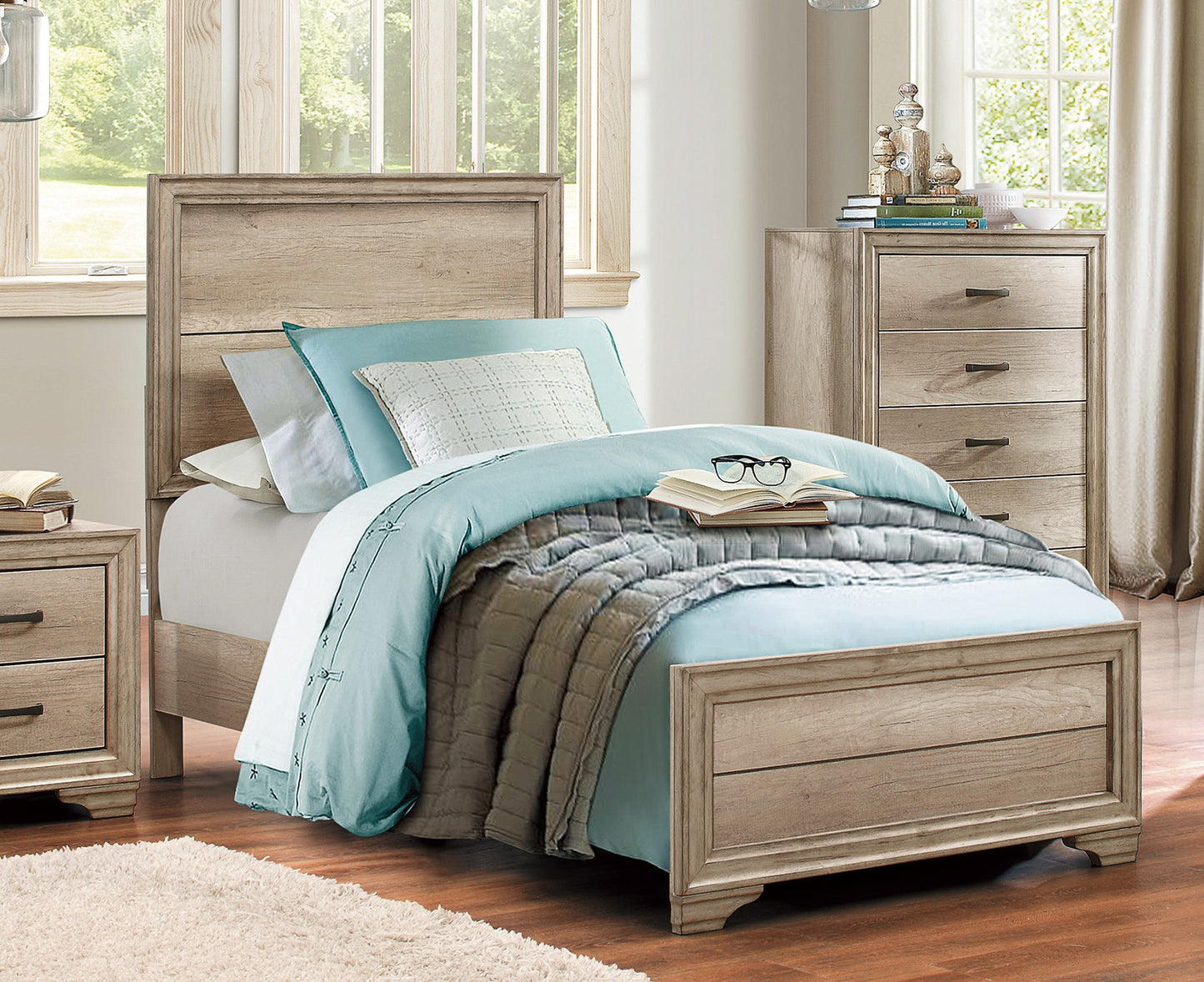 Light brown wood twin bed frame with blue bedding and gray quilt