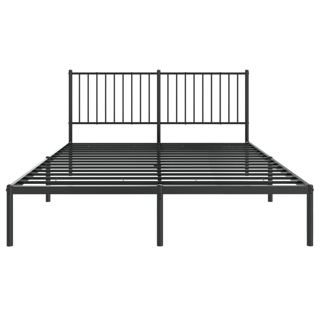 Black metal frame queen size bed with patterned bedding
