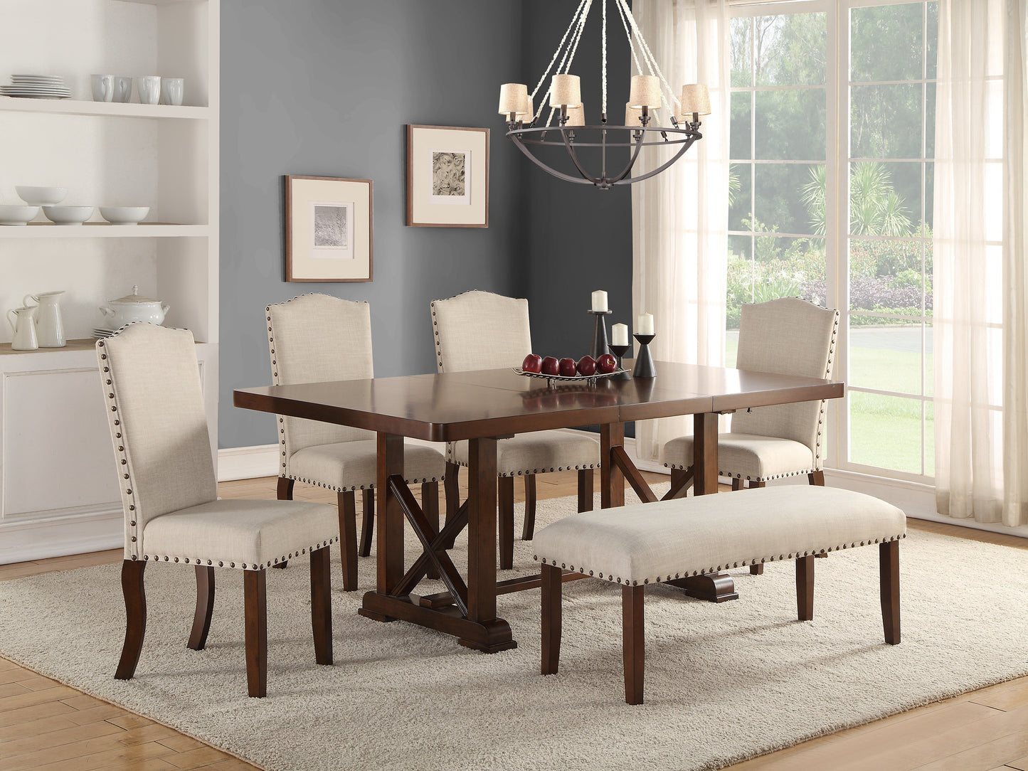Dark wood dining table set with upholstered chairs and bench