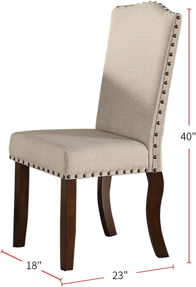 Beige upholstered dining chair with dark wood legs and nailhead trim