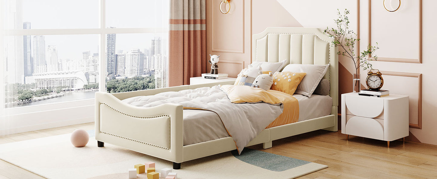 Cream velvet twin bed with tufted headboard and studded trim