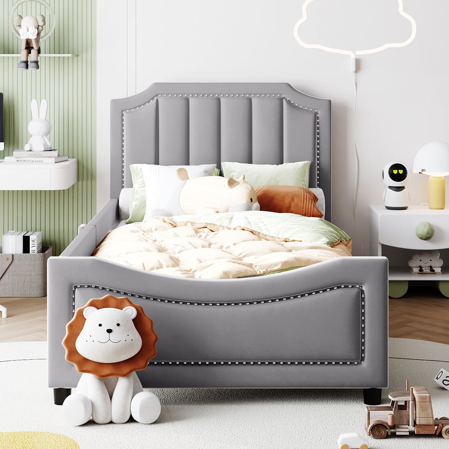 Grey upholstered twin bed with studded headboard and footboard