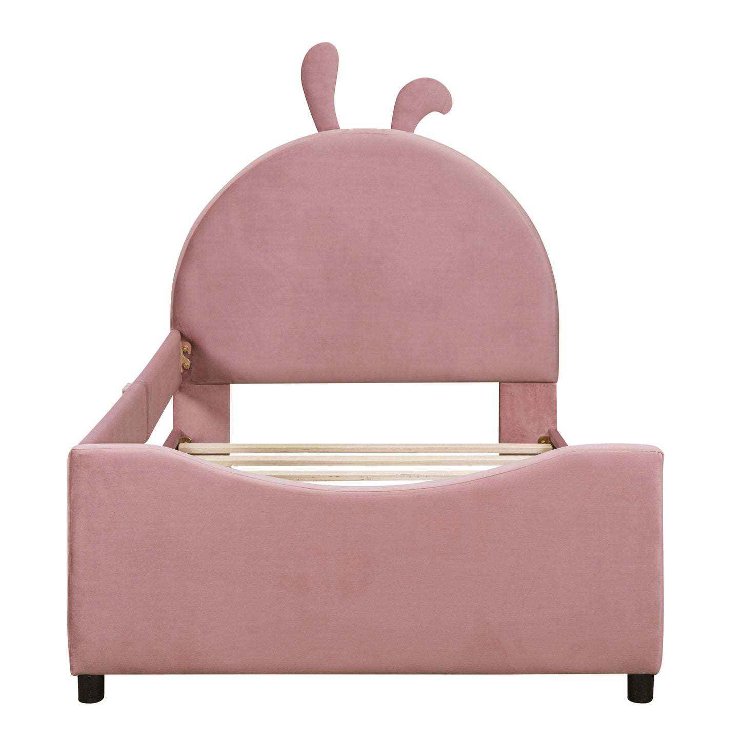 Pink velvet twin bed with playful bunny ears on headboard