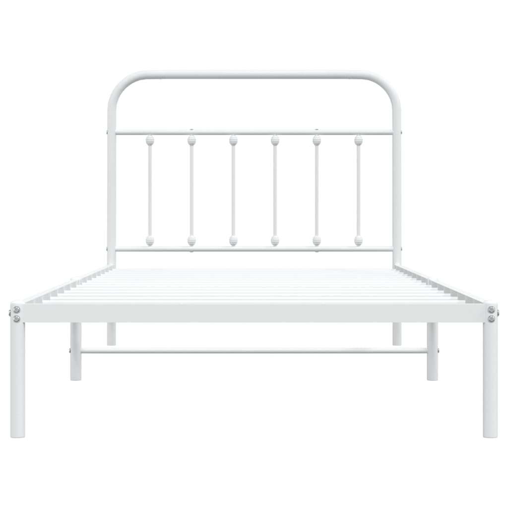 White metal twin bed frame with storage drawers and plaid bedding